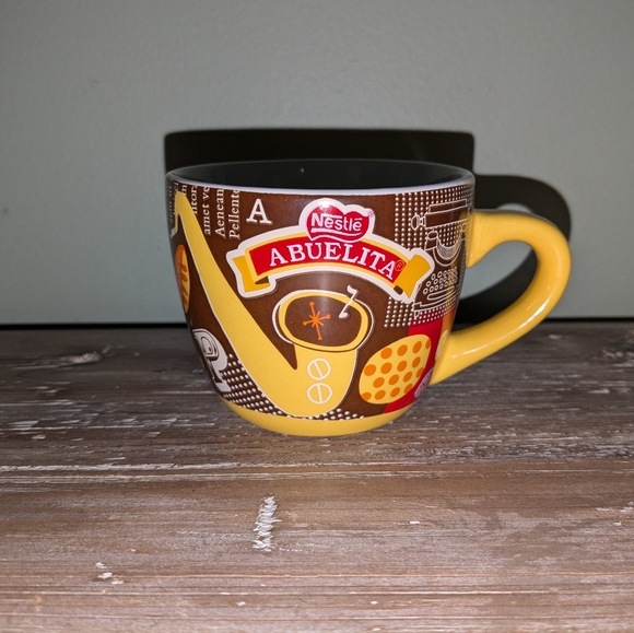 Nestle ABUELITA Ceramic 8 Oz Coffee Cup - Flavia Zorrilla Drago